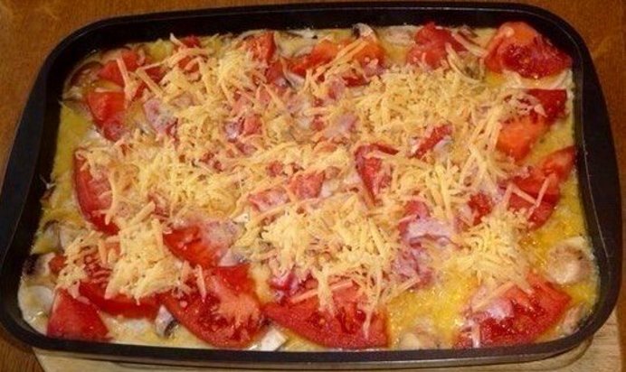 Свинина, запеченная с овощами под соусом бешамель