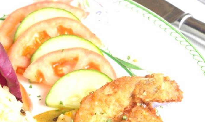 Жареные томатные ломтики в хлебных крошках