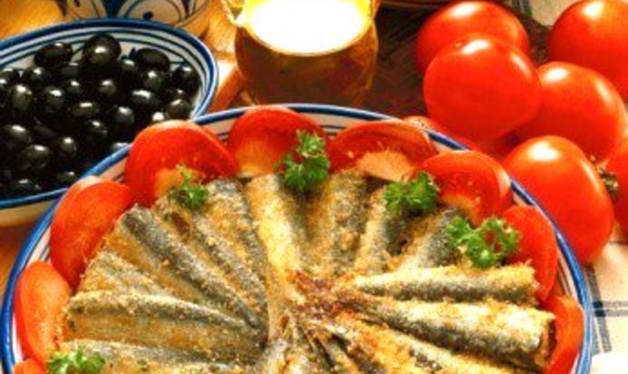 Сардины, запеченные с белым вином и панировочными сухарями