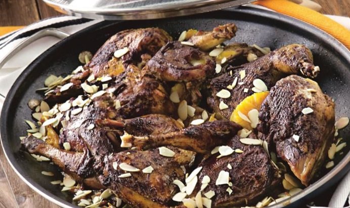 Фазан, тушенный с апельсинами и виноградным соком