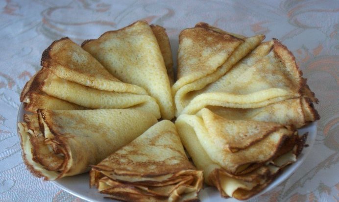 Блинчики на кефире со сливочным маслом