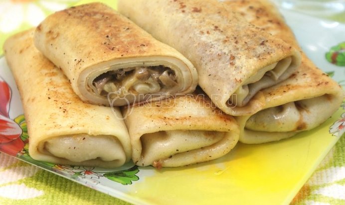Фаршированные блины с грибами и сыром
