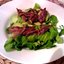 Салат из авокадо, рукколы и анчоусов
