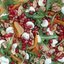 Зеленый салат с хурмой, гранатом и моцареллой