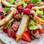 Салат с курицей, ягодами и орехами