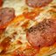 Пицца "Сальчичон" с помидорами черри и моцареллой