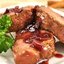 Пряные медальоны из свинины в клюквенно-апельсиновом соусе