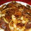 Говядина с маринованным луком