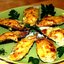 Мидии в ракушках, запеченные с сыром