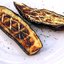 Баклажаны на гриле с чесноком, лимонным соком и тмином
