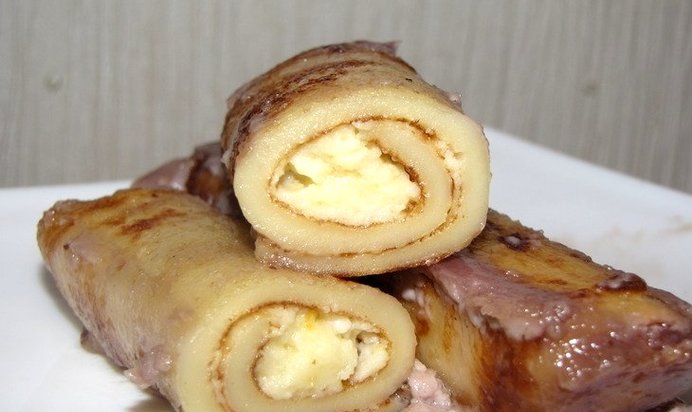 Блинчики с творогом, запеченные в сметане